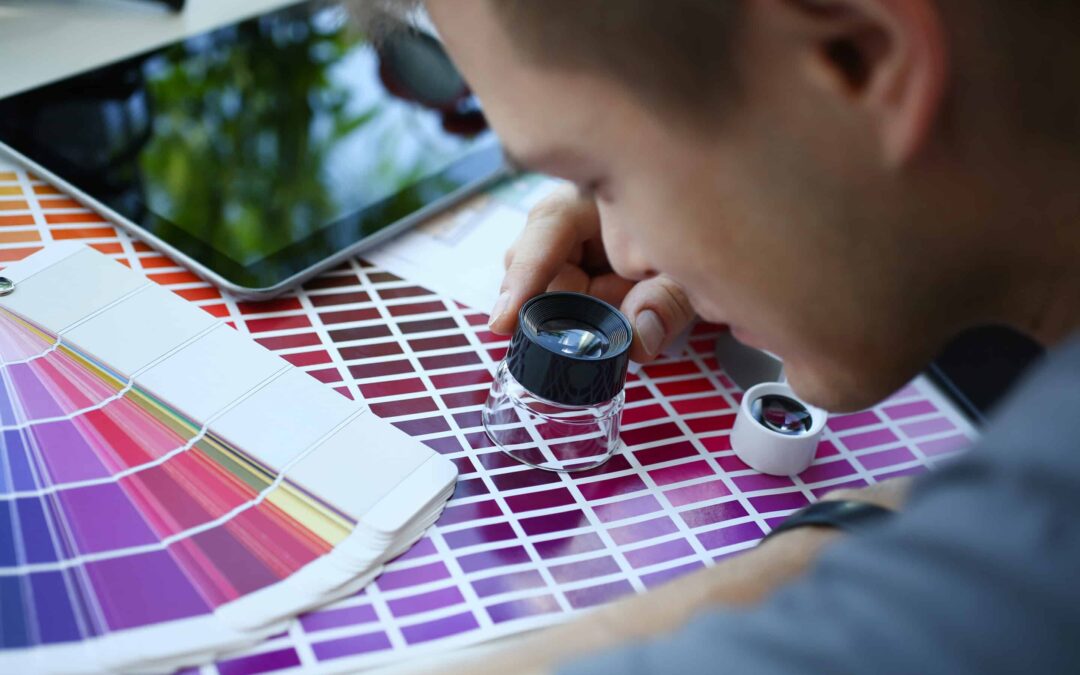 Male serviceman hold in hand magnifying glass making colour test