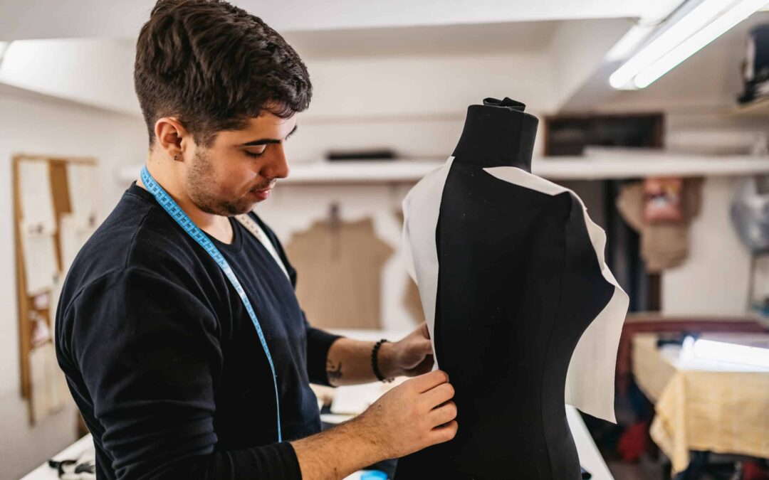 Male Fashion Designer In Studio